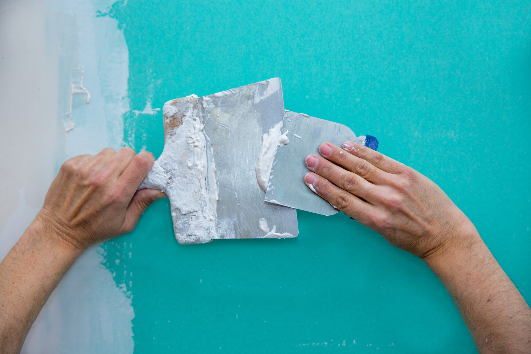 Plastering Man Hands